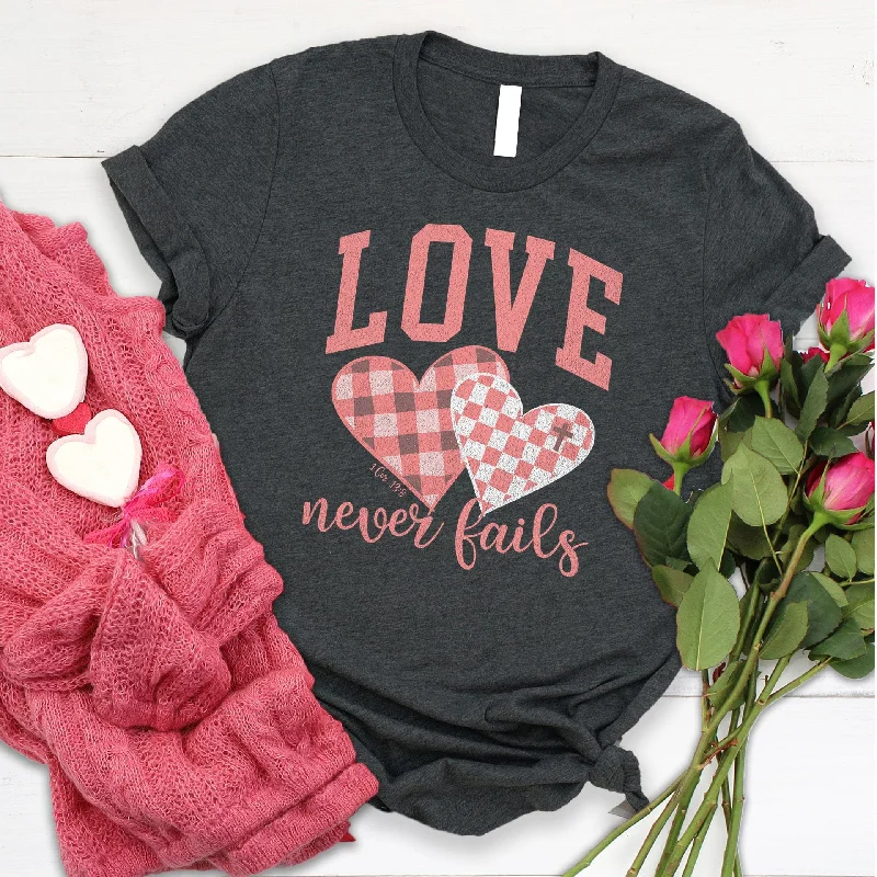 Limited Styles Love Never Fails Varsity Tee